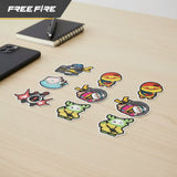 Free Fire Booyah! sticker set featuring colourful game-inspired character designs, displayed on a holographic package, desk, and smartphone.