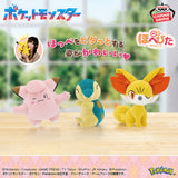 Banpresto Pokémon plush toys featuring pink Clefairy with a winking expression, blue-and-cream Cyndaquil, and yellow-and-orange Fennekin with large ears.