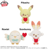Banpresto Pokémon plush toys featuring Pikachu, Rowlet, and Scorbunny holding red heart cushions in cute pastel designs.