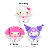 Official Sanrio Characters Fluffy Ribbon Angel Doll 1 Series plush featuring Hello Kitty, My Melody, and Kuromi dressed in fluffy angel-inspired outfits with soft white wings, pastel ribbon accents, embroidered facial details, and plush polyester fabric. A cute and collectible Sanrio prize plush, perfect for display, gifting, or adding to any kawaii collection.