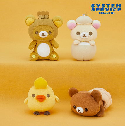 Set of 4 Rilakkuma Oden Costume Mascot Keychains displayed in a clear view
